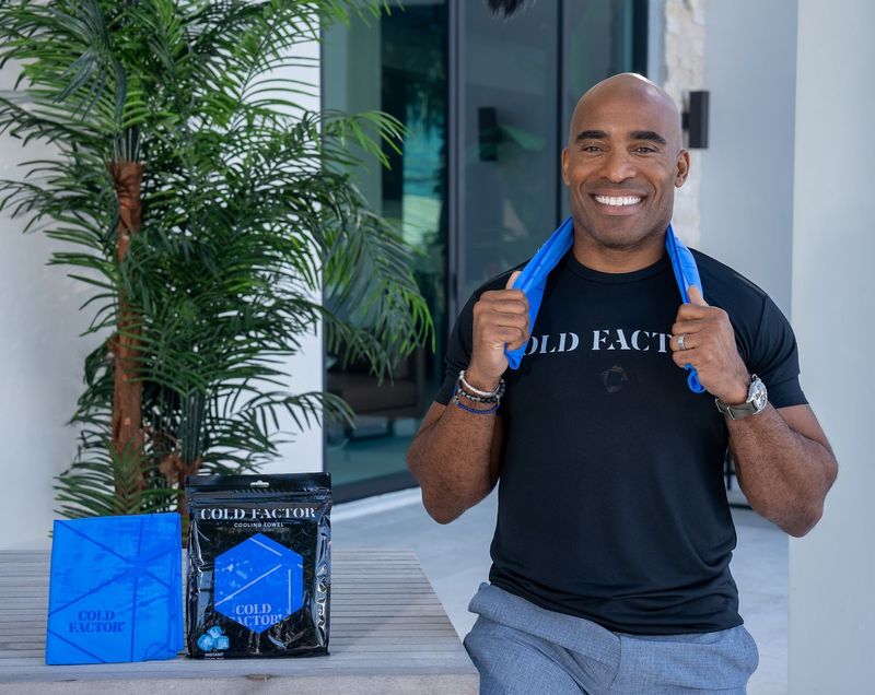 Smiling man with award winning cooling towel